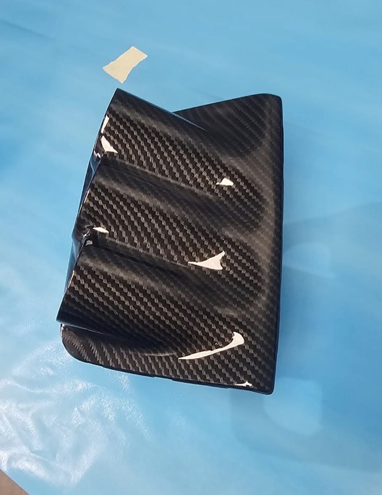 Auto Trim · Carbon Fiber + Swoosh